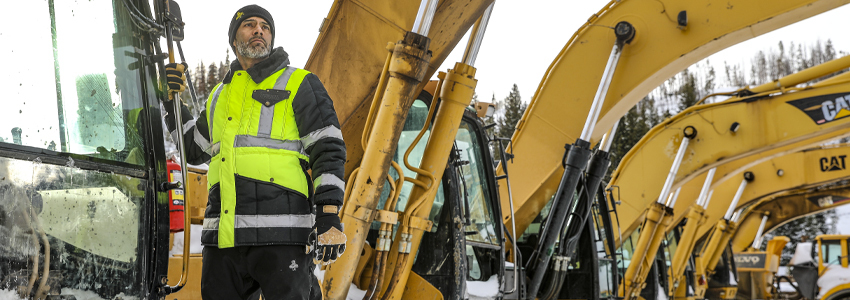 Man wearing HiVis Iron-Tuff gear working construction