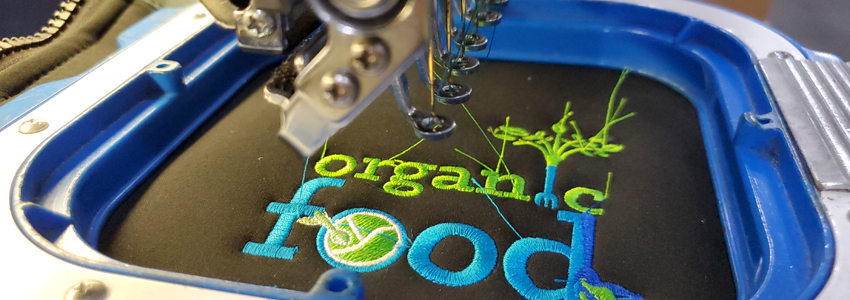 Close up shot of embroidery in process. RefrigiWear has an in-house embroidery team to personalize your gear.